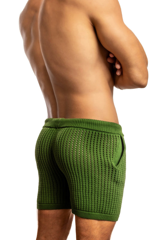 Man standing wearing a pair of Jack Adams army Roddy Crochet Knit Shorts (back view) on a white background.