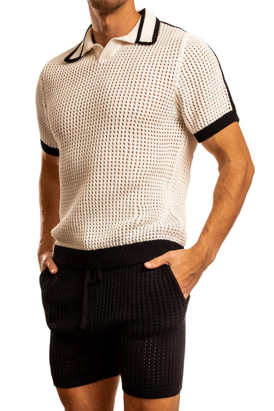 Man standing wearing a pair of Jack Adams white Matteo Crochet Knit Pull Over Shirt (profile view) on a white background.
