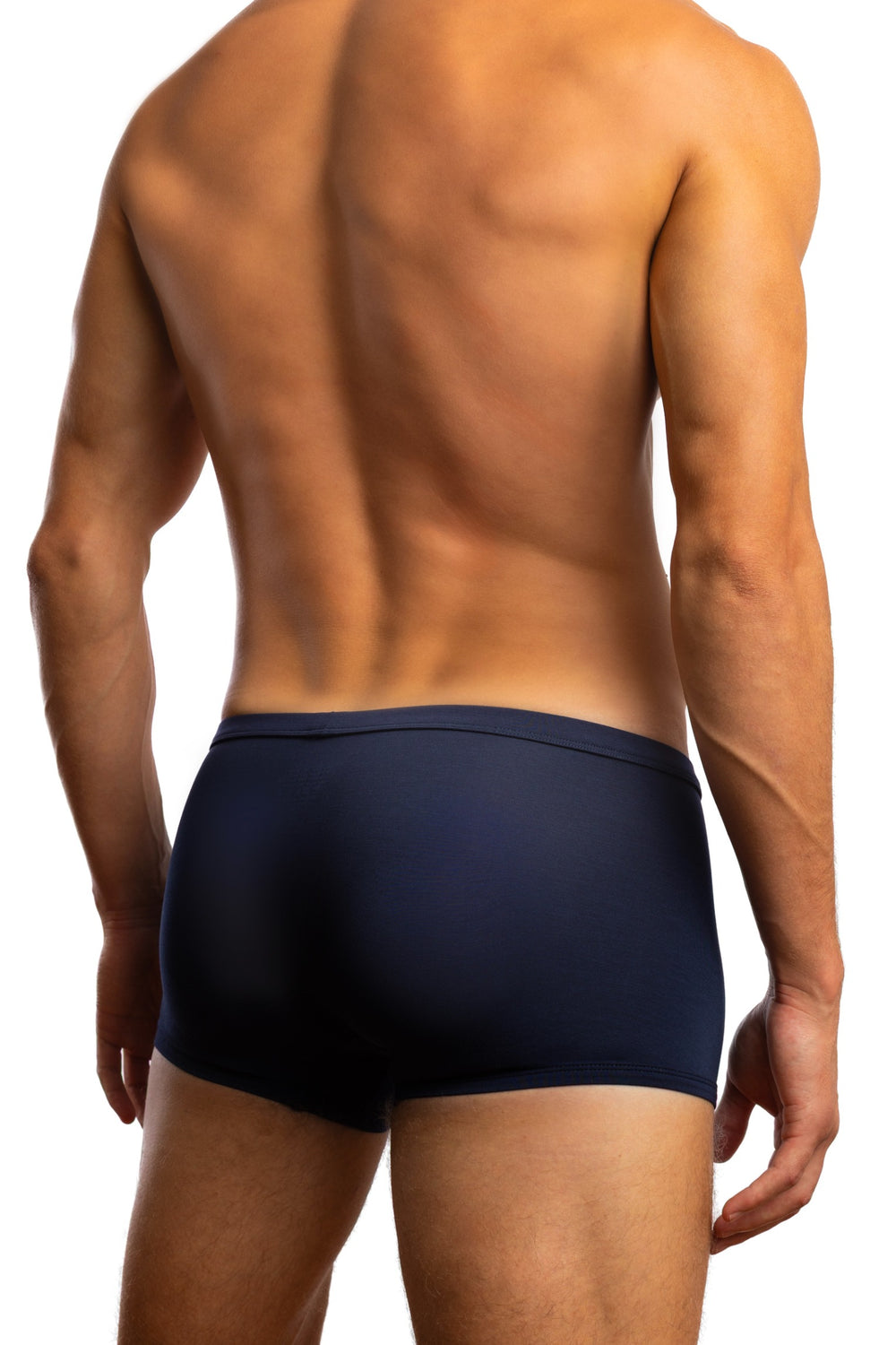 Shirtless man standing in front of a white background wearing a pair of Jack Adams In Intimo Modal Streamlined Trunk in midnight blue (back view)